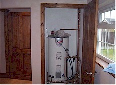Megaflow boiler in cupboard